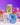 Colorful Fun Cube squishy toys in and out of their packaging on a purple background.